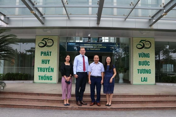 Giang Nguyen and Mikael Nastamo outside Traphaco’s Hung Yen factory plant.